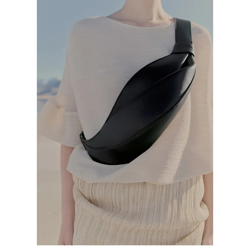 New large capacity pillow shaped personalized niche travel smooth cowhide crossbody bag