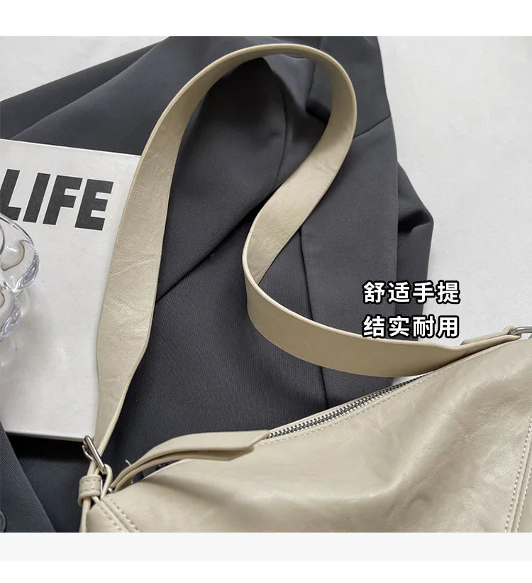 Niche Design Simple Solid Colour Dumpling Bag Women New Fashion Senior Sense PU Leather Shoulder Bag Versatile Crossbody Bag