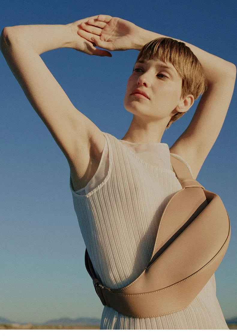 New large capacity pillow shaped personalized niche travel smooth cowhide crossbody bag