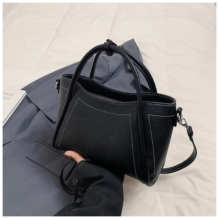 2025 new style large-capacity high-end PU messenger bag for daily commuting, soft leather wing bag for women