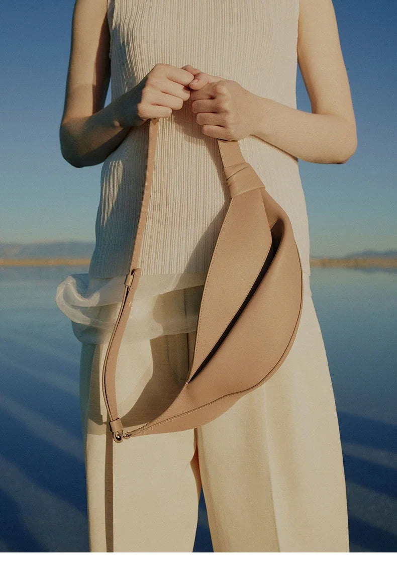 New large capacity pillow shaped personalized niche travel smooth cowhide crossbody bag