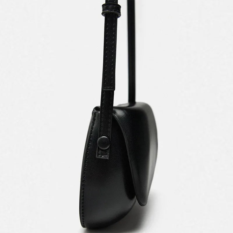 Female casual black small pu leather saddle armpit bag 2025 luxury designer chain shoulder cross bag women vintage armpit handba