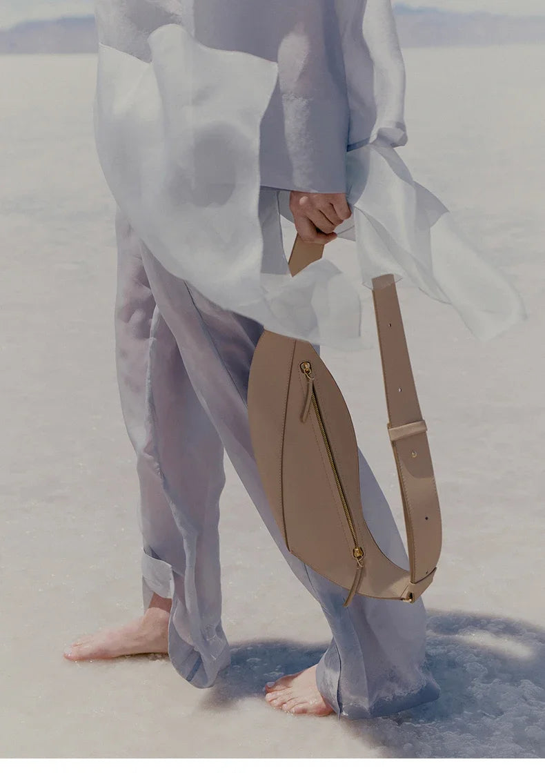 New large capacity pillow shaped personalized niche travel smooth cowhide crossbody bag