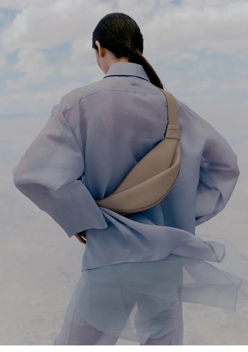 New large capacity pillow shaped personalized niche travel smooth cowhide crossbody bag