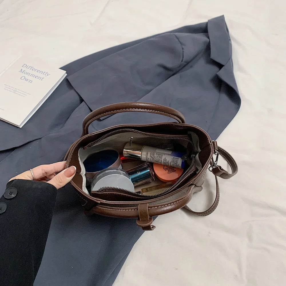 2025 new style large-capacity high-end PU messenger bag for daily commuting, soft leather wing bag for women