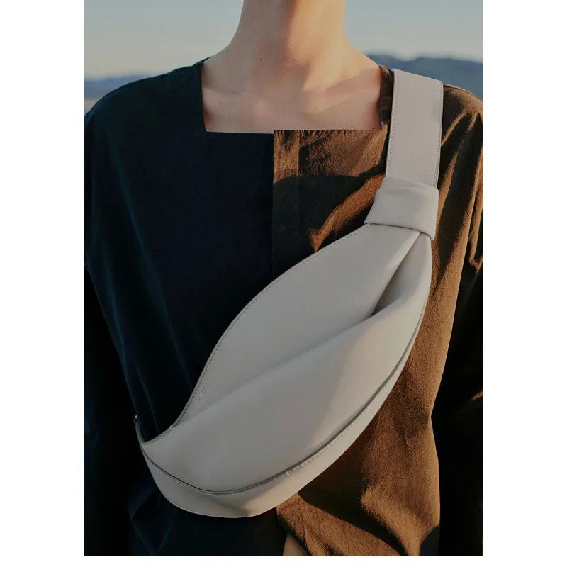 New large capacity pillow shaped personalized niche travel smooth cowhide crossbody bag